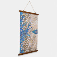 Een paisleymotief in blauw en bruin, display