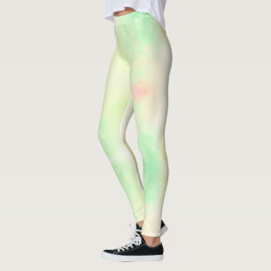 Een persoon die pastelkleurige groene leggings met