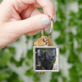 Een pintball-ronde sleutelhanger (Hand)