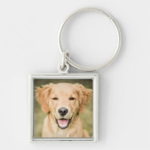 Een portret van een Golden Retriever puppy Sleutelhanger