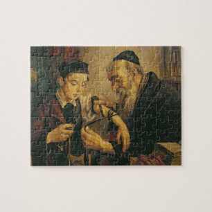 Een rabbijn die de Phylacteries aan de arm van een Legpuzzel