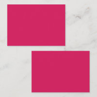 Een reeks rode en roze bloemen met weelderige groe