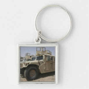 Een rij humvees van het Militaire Politiek van de Sleutelhanger