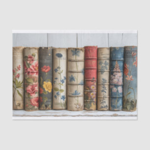 Een rij oude boeken met geschilderde bloemen tissuepapier