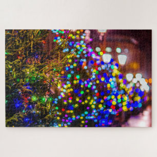 Een rij verlichte kerstbomen legpuzzel