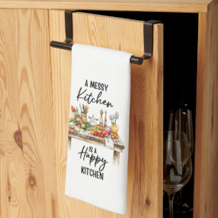 Een rommelige keuken is een gelukkige keuken theedoek