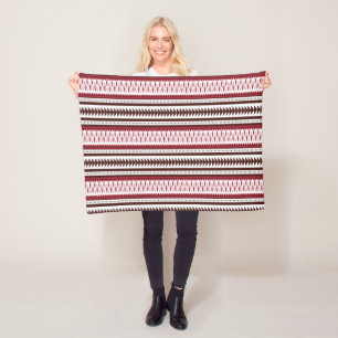 Een rood-wit gestreept patroon fleece deken