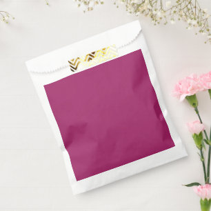Een roze achtergrond met een witte achtergrond bedankzakje