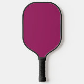 Een roze achtergrond met een witte rand pickleball paddle (Voorkant)