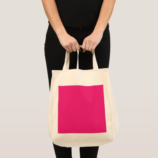 een roze achtergrond met een zwarte rand tote bag (Voorkant (product))