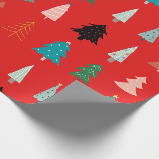 Een schattig kerstpatroon met rode groene bomen cadeaupapier (Hoek)