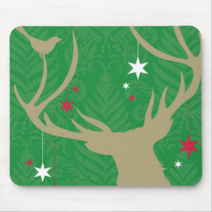 Een silhouet van een hert met sterren die uit zijn muismat