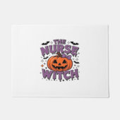Een speels ontwerp met een pompoenheks met een deurmat (Voorkant)