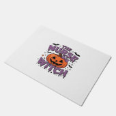 Een speels ontwerp met een pompoenheks met een deurmat (Schuin)