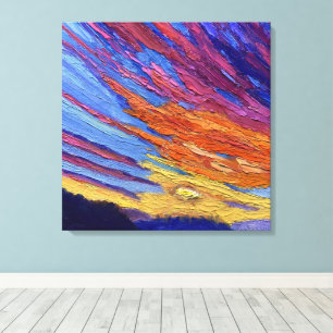 Een stralende zonsondergang in rood, paars, oranje canvas afdruk