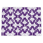 Een symmetrisch patroon met witte en paarse m groot cadeauzakje (Voorkant)