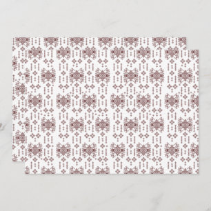 Een symmetrisch wit inpakpapier met een rep bedankkaart