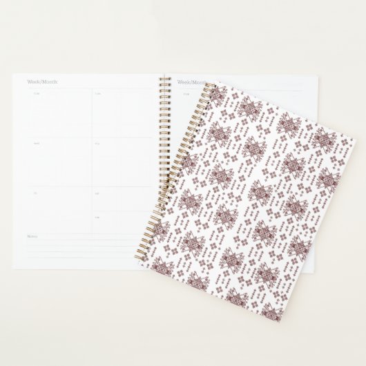 Een symmetrisch wit inpakpapier met een rep planner (Display)
