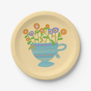 Een theekopje vol bloemen papieren bordje