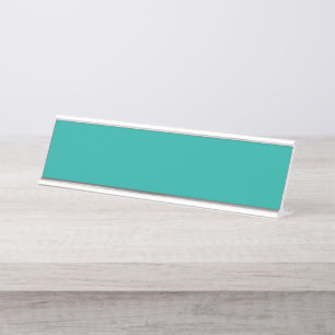 Een verloopachtergrond die blauw in groen overvloe bureau naambordje