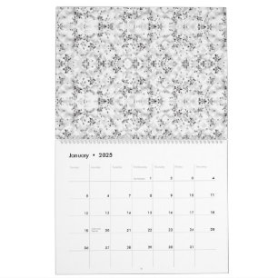 Een visueel opvallende witte en zwarte patroonmuur kalender