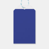 Een vliegtuig dat in de lucht vliegt met een blauw cadeaulabel (Achterkant)