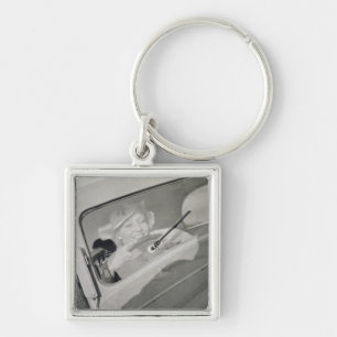 Een vrouw die rijdt, c.1930s (fotogravure) sleutelhanger