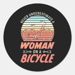 Een vrouw op een fiets ronde sticker