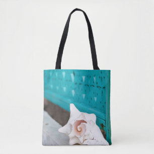 Een wit en roze Jamaicaans Zee Shell zit alleen Tote Bag