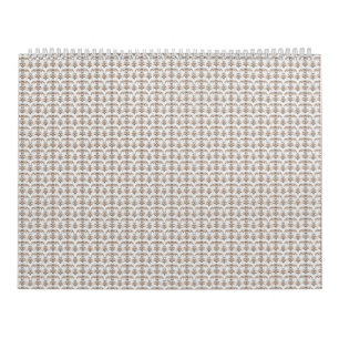 Een witte achtergrond met een bruin patroon erop kalender