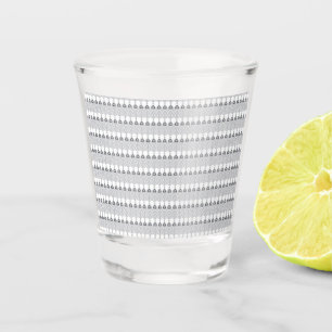 Een witte achtergrond met een patroon van cirkels shot glas