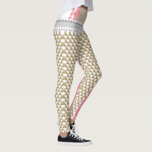 Een witte achtergrond met groene bladeren erop leggings