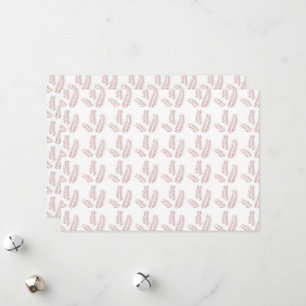 Een witte achtergrond met roze bladeren erop feestdagenkaart