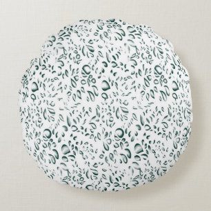 Een witte achtergrond met veel druppels water rond kussen