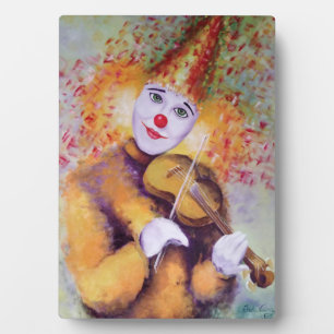 Een zoete clown die de viool speelt fotoplaat