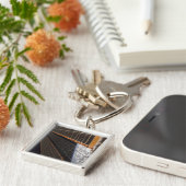 Een zonnepanelenvleugel sleutelhanger (Zijkant)