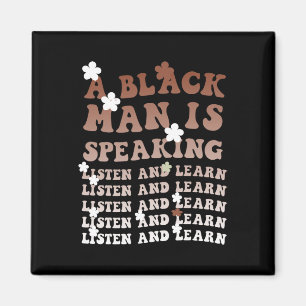 Een zwart Man spreekt, luistert en leert zijn zwar Magneet