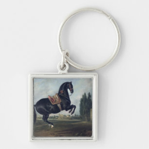 Een zwart paard dat de Courbette uitvoert Sleutelhanger