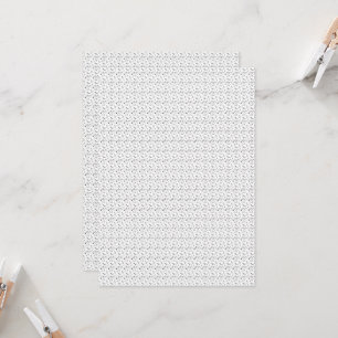 Een zwart-wit foto van bubbels op een witte rug kaart