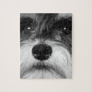 Een zwarte en witte miniatuur Schnauzer Legpuzzel