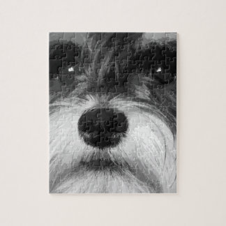 Een zwarte en witte miniatuur Schnauzer Legpuzzel
