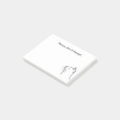 Een zwarte tekenende schattige kat die opkijkt na  post-it® notes (Schuin)