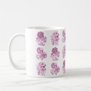 Eenkleurige bloemen in roze koffiemok