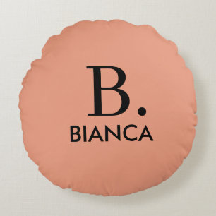 Eenvoudig koraal roze minimalistisch monogram rond kussen