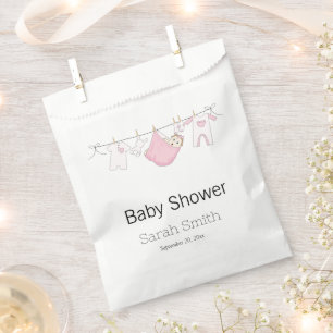 Eenvoudig roze crèmedop Baby shower Bedankzakje