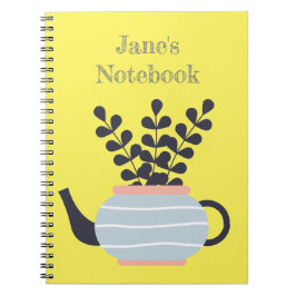 Eenvoudige moderne theepot met plant pastel notitieboek