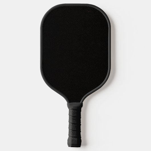 Eenvoudige zwarte achtergrond met een licht patroo pickleball paddle (Achterkant)