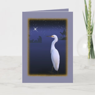 Egret neigeux avec carte de Noël de la Nativité