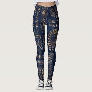 Egyptische hiërogliefen en goddelijk goud op marme leggings