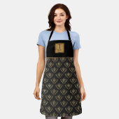 Eigen monogram, koningin, zwart en goud schort (Gedragen)